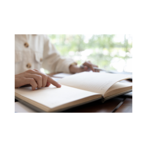 A person reading an agenda